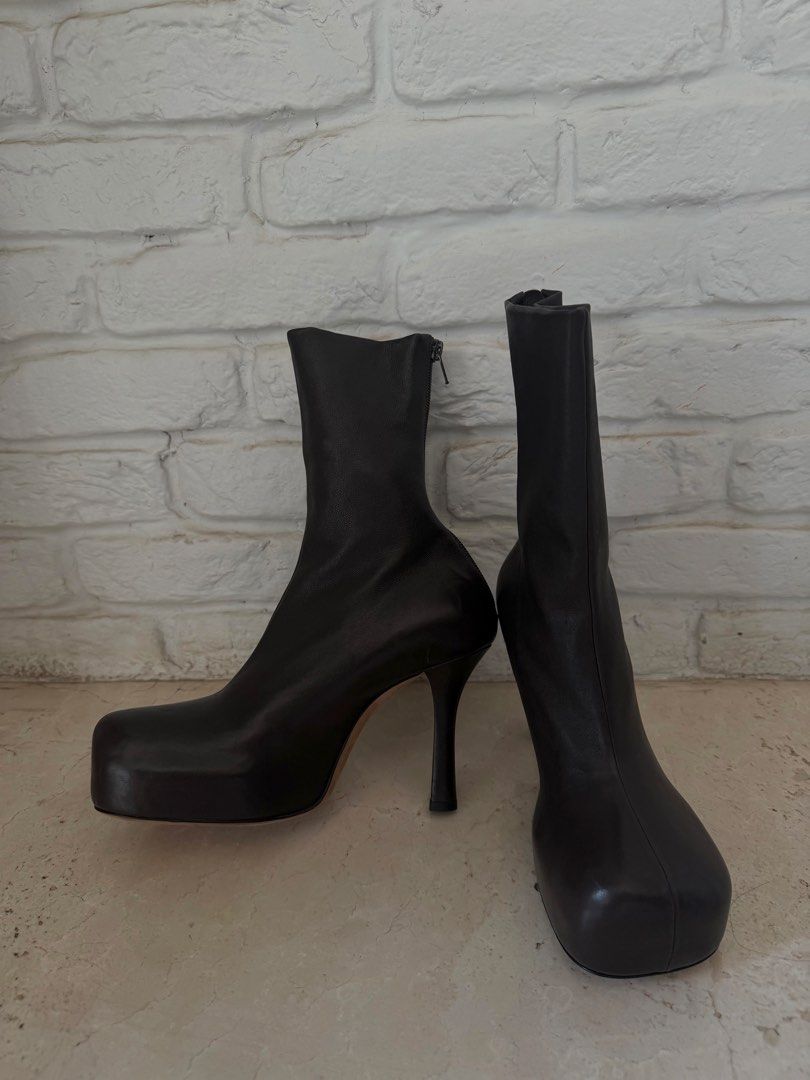 Bottega Veneta Bold Leather Ankle Boots (Category: Sneakers & Footwear) located in Pasig City. Submitted by x.declutter (Listing ID 1434930131, Image 2). Description: - Dark Chocolate Brown Color -HEEL: 9 CM - Back Zip Closure - VOLUMINOUS ROUNDED TOE - SOLE WITH PLATFORM - 100% LEATHER - MADE IN ITALY *last Photo for reference only AVAILABLE FOR SHIPPING FROM AUG 23-28 ONLY.