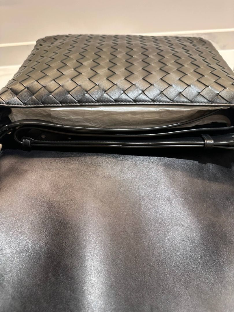 Bottega Veneta Swing Messenger Bag (Category: Luxury Bags & Wallets) located in Manila. Submitted by mervtke (Listing ID 1434976437, Image 2). Description: - Authentic Bottega Veneta Swing Messenger Bag - Color: Black - Signature intrecciato weave - Includes dust bag & original receipt - Double strap for shoulder/cross body carry or underarm. - Flap with magnetic closure - Internal zip pouch Retails at USD 4,900 .