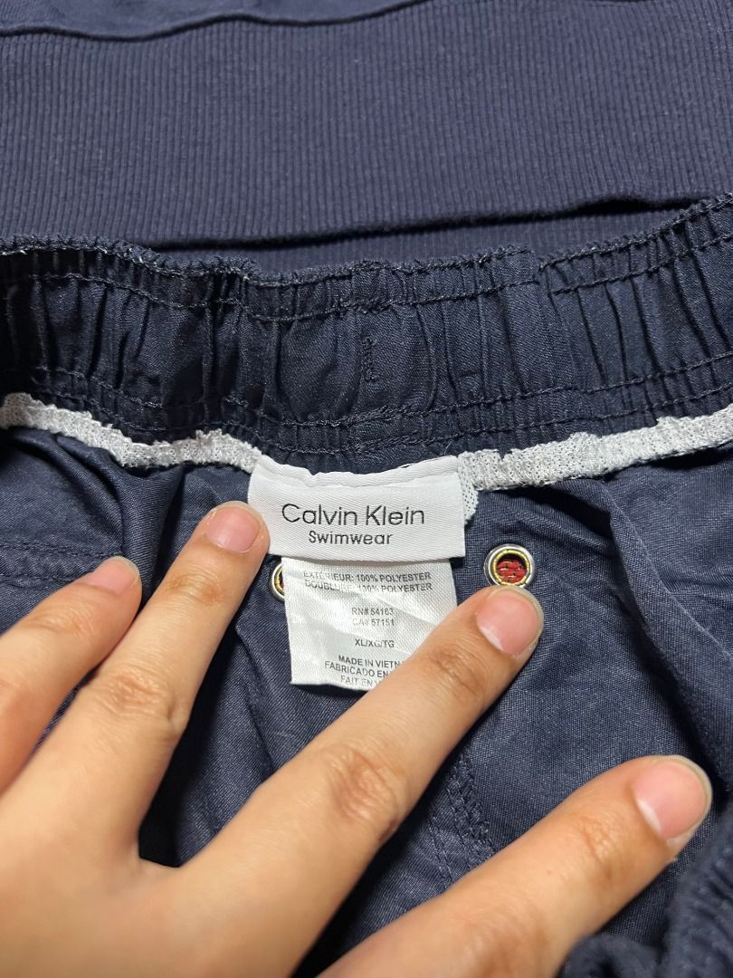 Calvin Klein Sweatshirt and Shorts Set (Category: Sets & Coordinates) located in Quezon City. Submitted by don.fitss (Listing ID 1434949195, Image 3). Description: - Navy blue Calvin Klein set - Sweatshirt with Calvin Klein logo on chest and sleeve - Shorts with Calvin Klein logo - Sweatshirt size: L/G - Made in Indonesia.