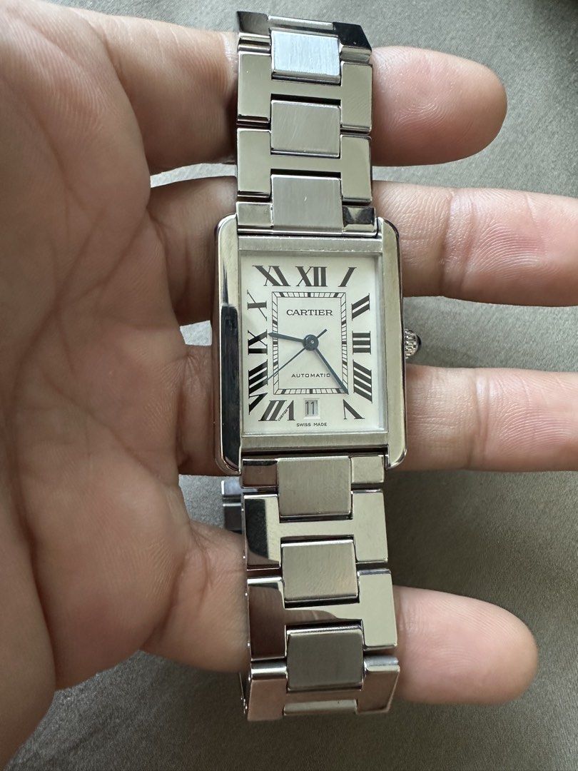 Cartier Tank Solo XL - Automatic (Category: Luxury Watches) located in Quezon City. Submitted by eric.eric10 (Listing ID 1434816967, Image 1). Description: Cartier Tank Solo XL Automatic – W5200028 Clean & classic Cartier piece Perfect daily dress watch Details: • Reference W5200028 • XL size (31 x 40.8mm) • Automatic movement (Cal. 049) • Stainless steel case • Date function • Sapphire crystal • Excellent condition Inclusions: • Complete set, bo