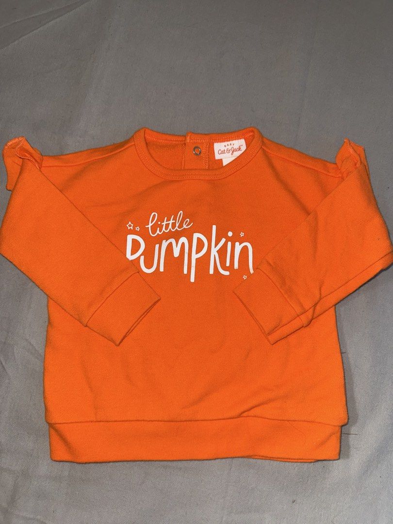Cat & Jack Little Pumpkin Sweatshirt 6-9M (Category: Babies & Kids Fashion) located in Cavite. Submitted by Mj_BABY_CLOTHES (Listing ID 1434850735, Image 1). Description: - Adorable orange Cat & Jack sweatshirt. - Features "little pumpkin" in white. - Designed for babies 6-9 months. - Made in Vietnam. - Button closure at the back for easy dressing..