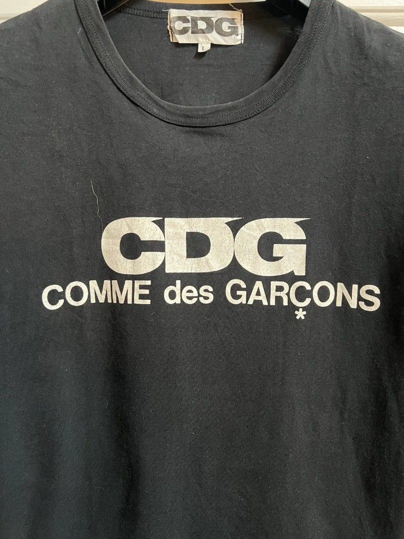 CDG Comme des Garcons Black T-shirt (Category: Tshirts & Polo Shirts ) located in Manila. Submitted by lostfromsanity (Listing ID 1434880986, Image 2). Description: 2010s CDG logo shirt nego for sure buyers dm for more pics and details bought from dover street no major issues .