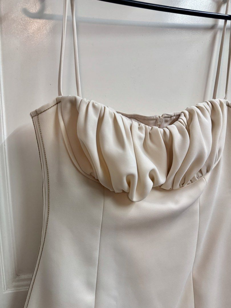 CHANANYA Cream Mini Dress (Category: Dresses) located in Manila. Submitted by mae-v (Listing ID 1434943640, Image 2). Description: - CHANANYA mini dress (Thailand Brand) - Cream color - Sweetheart neckline - Thick, high quality fabric - Gathered fabric detail at bust area - Thin straps - Fitted silhouette until waist, flares out at hip area - Size M (32 bust, 26 waist best fit) - Zipper closure at the back - Visible stitching details - Used once.