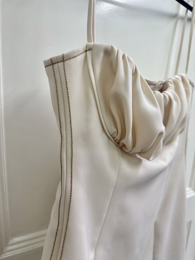 CHANANYA Cream Mini Dress (Category: Dresses) located in Manila. Submitted by mae-v (Listing ID 1434943640, Image 3). Description: - CHANANYA mini dress (Thailand Brand) - Cream color - Sweetheart neckline - Thick, high quality fabric - Gathered fabric detail at bust area - Thin straps - Fitted silhouette until waist, flares out at hip area - Size M (32 bust, 26 waist best fit) - Zipper closure at the back - Visible stitching details - Used once.