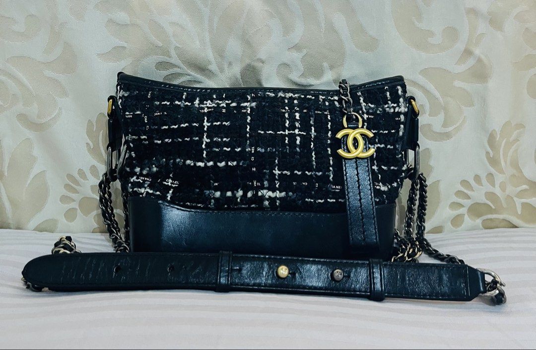 Chanel Gabrielle Hobo Bag (Category: Luxury Bags & Wallets) located in Iloilo. Submitted by yangfire (Listing ID 1434886226, Image 1). Description: - Black and white tweed upper - Black leather base and strap - Includes chain strap - Includes detachable leather strap - Red fabric interior - Serial number present - Made in Italy - 8/10 (sign of use) Pre LOVED What you see in the picture is what you can get. 🪬 feel free to ask more pictures..