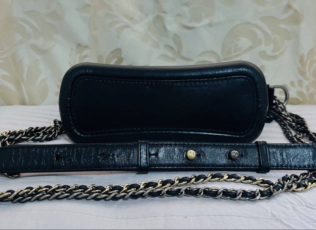 Chanel Gabrielle Hobo Bag (Category: Luxury Bags & Wallets) located in Iloilo. Submitted by yangfire (Listing ID 1434886226, Image 3). Description: - Black and white tweed upper - Black leather base and strap - Includes chain strap - Includes detachable leather strap - Red fabric interior - Serial number present - Made in Italy - 8/10 (sign of use) Pre LOVED What you see in the picture is what you can get. 🪬 feel free to ask more pictures..