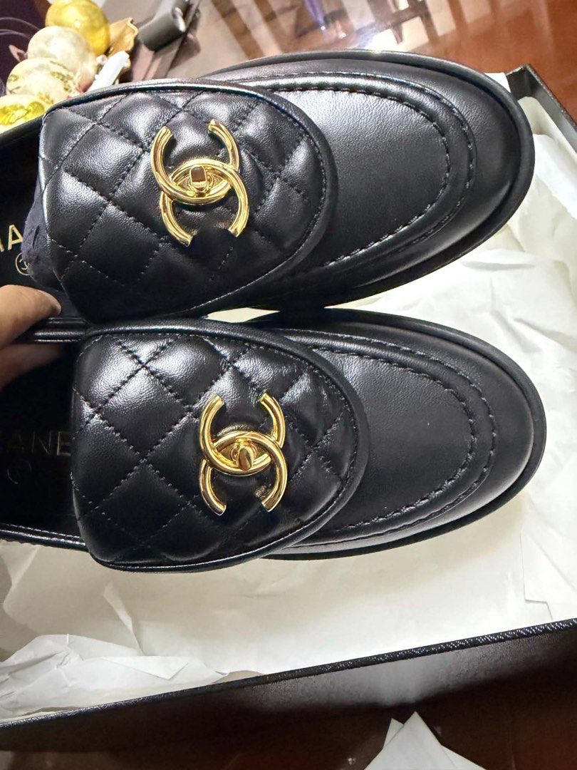 Chanel Quilted Leather Moccasins (Category: Loafers) located in Quezon City. Submitted by mscasp (Listing ID 1434819635, Image 3). Description: - Authentic Chanel moccasins - Black leather - Size 38.5 - Quilted design with CC logo - Includes original box, dust bag, and authenticity card - Made in Italy - Purchased from Saks Fifth Avenue.