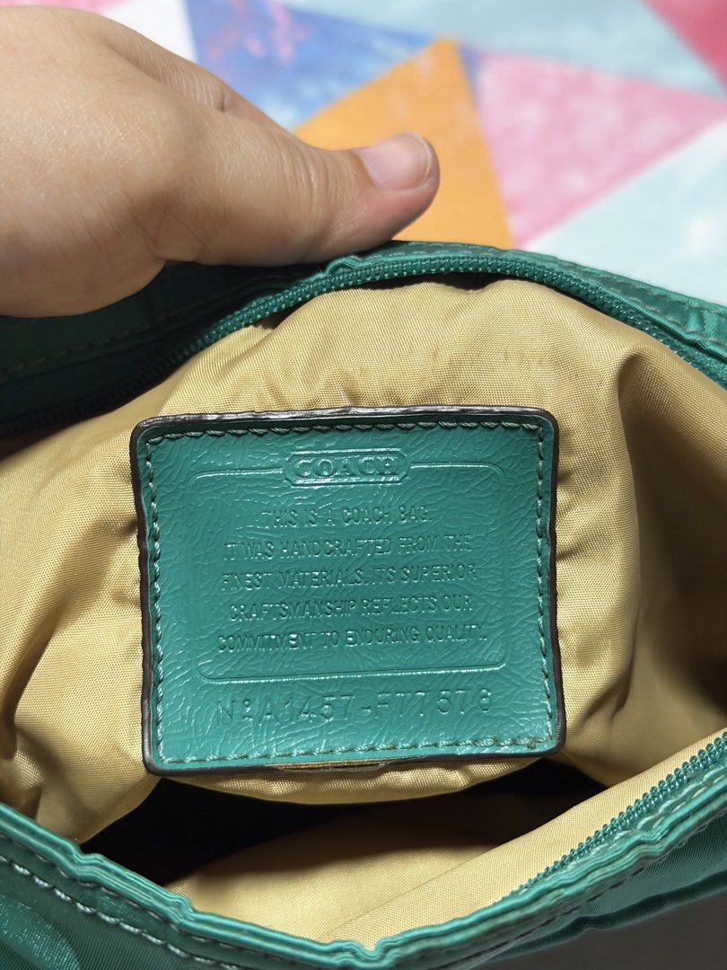 Coach Nylon Sling Bag (Category: Luxury Bags & Wallets) located in Manila. Submitted by roxyxx19 (Listing ID 1434828852, Image 3). Description: - Coach Nylon Sling bag - Authentic US Bought - Needs cleaning, no major flaws - Size is in the pic already.