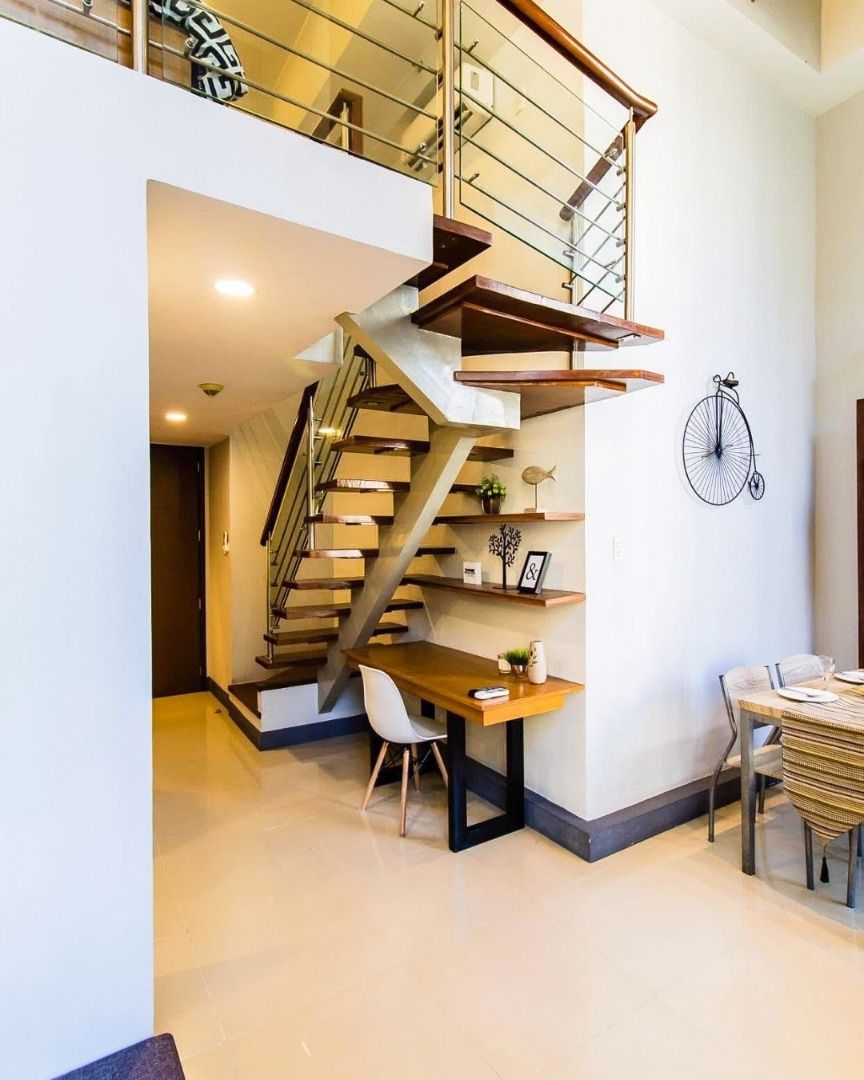 Condominium For Sale Bellagio 3 BGC (Category: Apartments & Condos) located in Quezon City. Submitted by leadvision.realty (Listing ID 1434895538, Image 3). Description: Looking for a 1BR loft at Bellagio 3? 😉 Defined by soaring ceilings and floor-to-ceiling windows, this loft-style residence feels bright, open, and effortlessly refined. A sleek glass staircase and built-in workspace complete its smart, contemporary design—ideal for modern city 