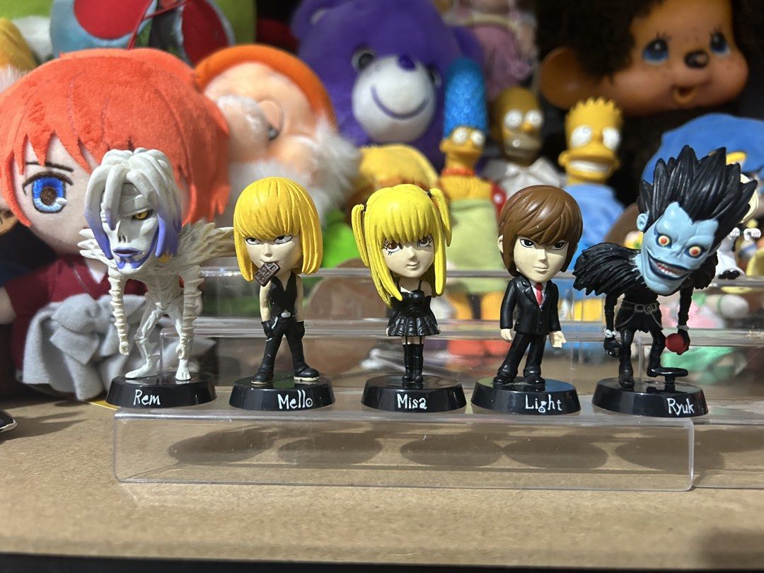 Death Note Figurines Set (Category: Figurines & Statues) located in Victoria. Submitted by pisangpaulotoys (Listing ID 1434916603, Image 2). Description: - Death Note figurine set. - Includes Mello, Misa, Light, Rem, and Ryuk figures. - Each figure is on a black base. - Bases have character names. - Highly detailed collectible items. - Ideal for Death Note fans..