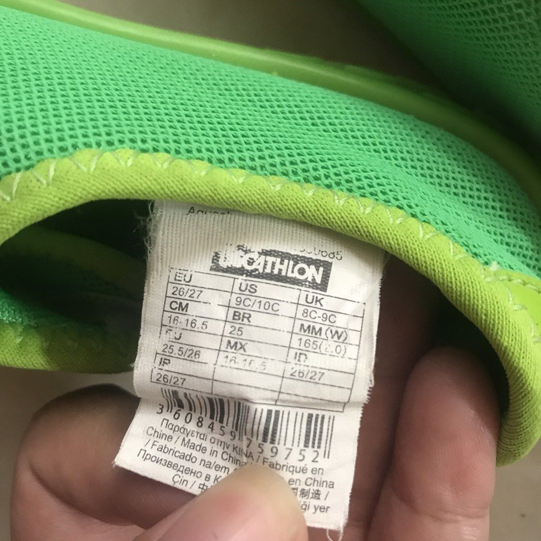 Decathlon Aquashoes for Kids (Category: Babies & Kids Fashion) located in San Miguel. Submitted by ilovesale014 (Listing ID 1434977469, Image 3). Description: - Decathlon Aquashoes - Size: 16-16.5 CM - Color: Bright green - Features: Mesh upper, textured sole for grip - Closure: Hook-and-loop - Condition: Good - Perfect for water activities and beach trips.