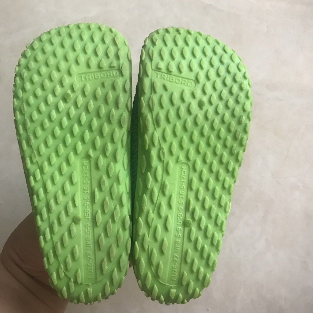 Decathlon Aquashoes for Kids (Category: Babies & Kids Fashion) located in San Miguel. Submitted by ilovesale014 (Listing ID 1434977469, Image 2). Description: - Decathlon Aquashoes - Size: 16-16.5 CM - Color: Bright green - Features: Mesh upper, textured sole for grip - Closure: Hook-and-loop - Condition: Good - Perfect for water activities and beach trips.