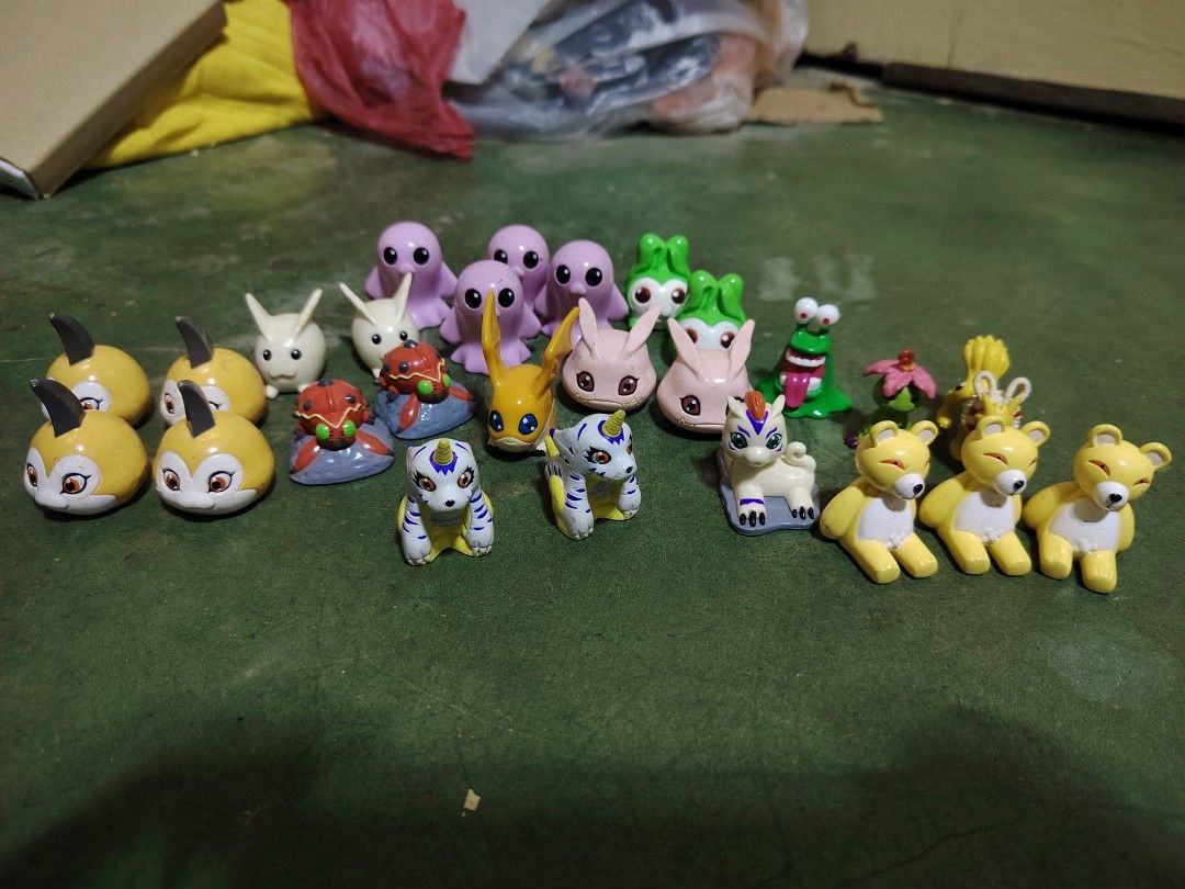 Digimon 26 Pieces (Category: Figurines & Statues) located in Baguio. Submitted by lukewarmwaterboy (Listing ID 1434924351, Image 1). Description: - Digimon figurines available! - Features various characters. - Includes yellow bear-like and rabbit-like figures. - Great for collectors and Digimon fans. - Small and detailed for display..