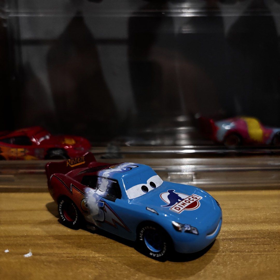 Disney Pixar Cars Lightning McQueen Transforming Mcqueen Custom (Category: Vehicle & Diecast Models) located in Manila. Submitted by kachomp_collects (Listing ID 1434963775, Image 1). Description: - Lightning McQueen Dinoco diecast car - Features a blue and red color scheme - From the Disney Pixar Cars series - Diecast model - Ideal for Cars enthusiasts and collectors.