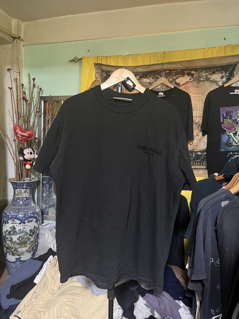 Essentials Fear of God Black T-shirt (Category: Tshirts & Polo Shirts ) located in Quezon. Submitted by shirthappens01 (Listing ID 1434884941, Image 2). Description: - Fear of God Essentials T-shirt - Features Essentials logo (back) and brand name (front) - Crew neck - Short sleeves.
