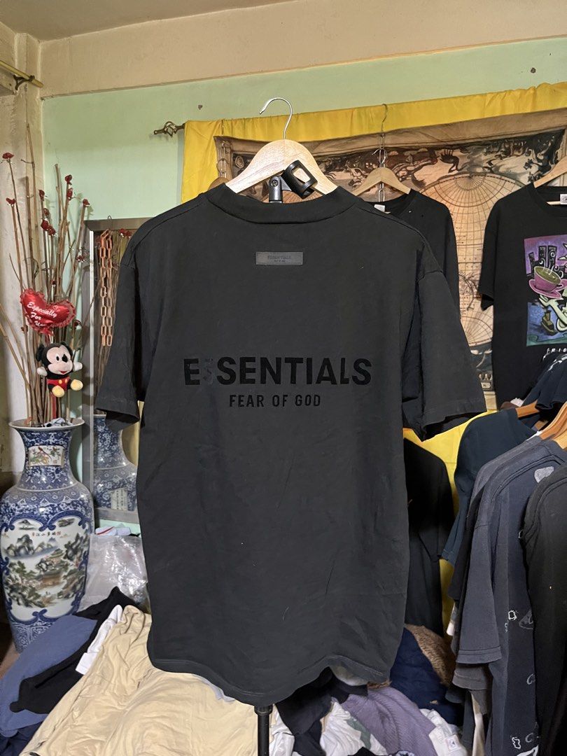 Essentials Fear of God Black T-shirt (Category: Tshirts & Polo Shirts ) located in Quezon. Submitted by shirthappens01 (Listing ID 1434884941, Image 1). Description: - Fear of God Essentials T-shirt - Features Essentials logo (back) and brand name (front) - Crew neck - Short sleeves.