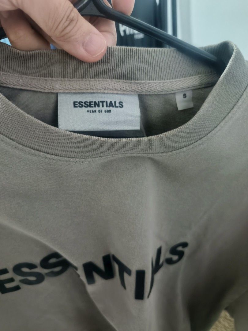 Essentials Fear of God T-shirt - Olive Green (Category: Tshirts & Polo Shirts ) located in Las Pinas. Submitted by live_marticko (Listing ID 1434935624, Image 2). Description: Essentials Fear of God T-shirt - Olive Green Shirt ✅Size: S on tag (Best fit M to L) ✅Color: Olive Green ✅Dimension: Width: 22.5" Length: 28 ✅Colorate: 9.5/10 - Olive green Essentials Fear of God T-shirt - Size: S - Material: 100% Cotton - Features "ESSENTIALS" print on the