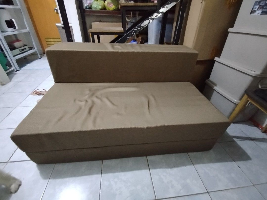 Foldable Sofa Bed (Category: Sofas) located in Taytay. Submitted by njcffff (Listing ID 1434830028, Image 2). Description: - Foldable sofa bed - Neutral brown color - Space-saving design - Easy to fold and unfold - Ideal for small spaces/guest room - Durable fabric - 48x75 - Negotiable - for pickup or lalamove.