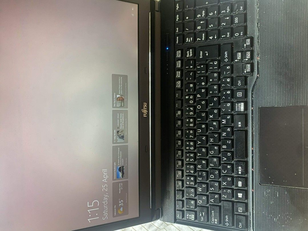 Fujitsu Laptop (Category: Laptops & Notebooks) located in Manila. Submitted by maggeee (Listing ID 1434934799, Image 3). Description: - Fujitsu laptop - Black body with red accents - Working and gaming condition - Screen displays time and date - Fujitsu logo visible -Good as new -Fast -1tb memory card Inclusion: -Charger -Web Cam -Laptop Bag Issue: Need replace the battery.