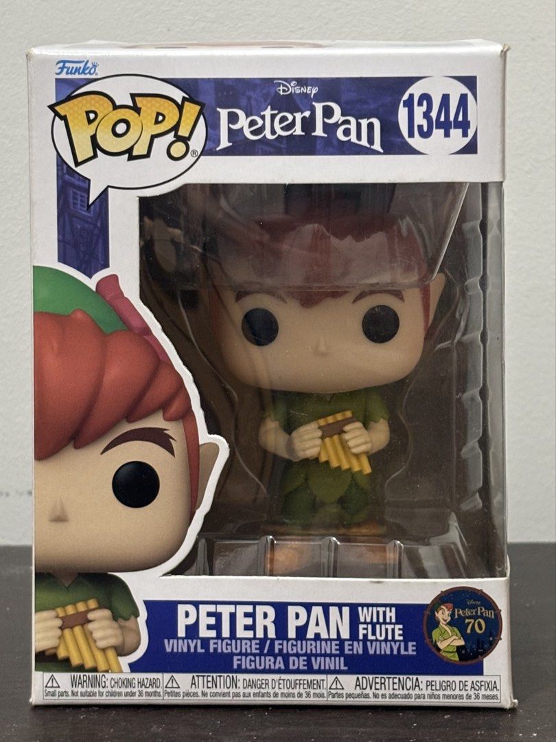 Funko Pop! Disney Peter Pan with Flute #1344 (Category: Figurines & Statues) located in Makati City. Submitted by mcarchives (Listing ID 1434834041, Image 1). Description: Funko Pop! figure features Peter Pan from the Disney movie, holding a flute. It is part of the Peter Pan series, with the number 1344..