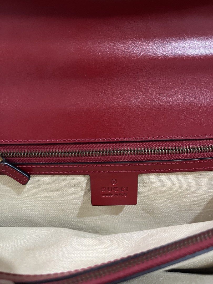 Gucci GG Marmont Shoulder Bag (Category: Luxury Bags & Wallets) located in Iloilo. Submitted by yangfire (Listing ID 1434893645, Image 3). Description: - PreLoved Gucci GG Marmont shoulder bag - Red leather exterior - Gold-tone chain strap - Iconic GG logo - Interior zipper pocket - Gucci logo and serial number tag - Structured design with multiple compartment - 7/10 (sign of use) iL be selling the bag for a lower price for the buyer to restore t