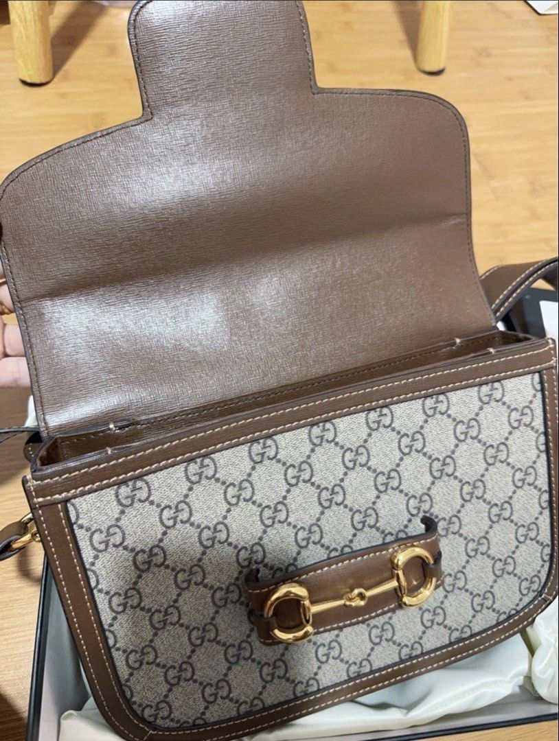Gucci Horsebit 1955 Shoulder Bag (Category: Luxury Bags & Wallets) located in Quezon City. Submitted by anneprelovess (Listing ID 1434927064, Image 2). Description: With dustbag and box - Iconic GG monogram canvas - Brown leather trim - Gold-tone hardware - Includes dust bag and original box - Interior: zippered pocket and main compartment - Flap closure with horsebit detail.