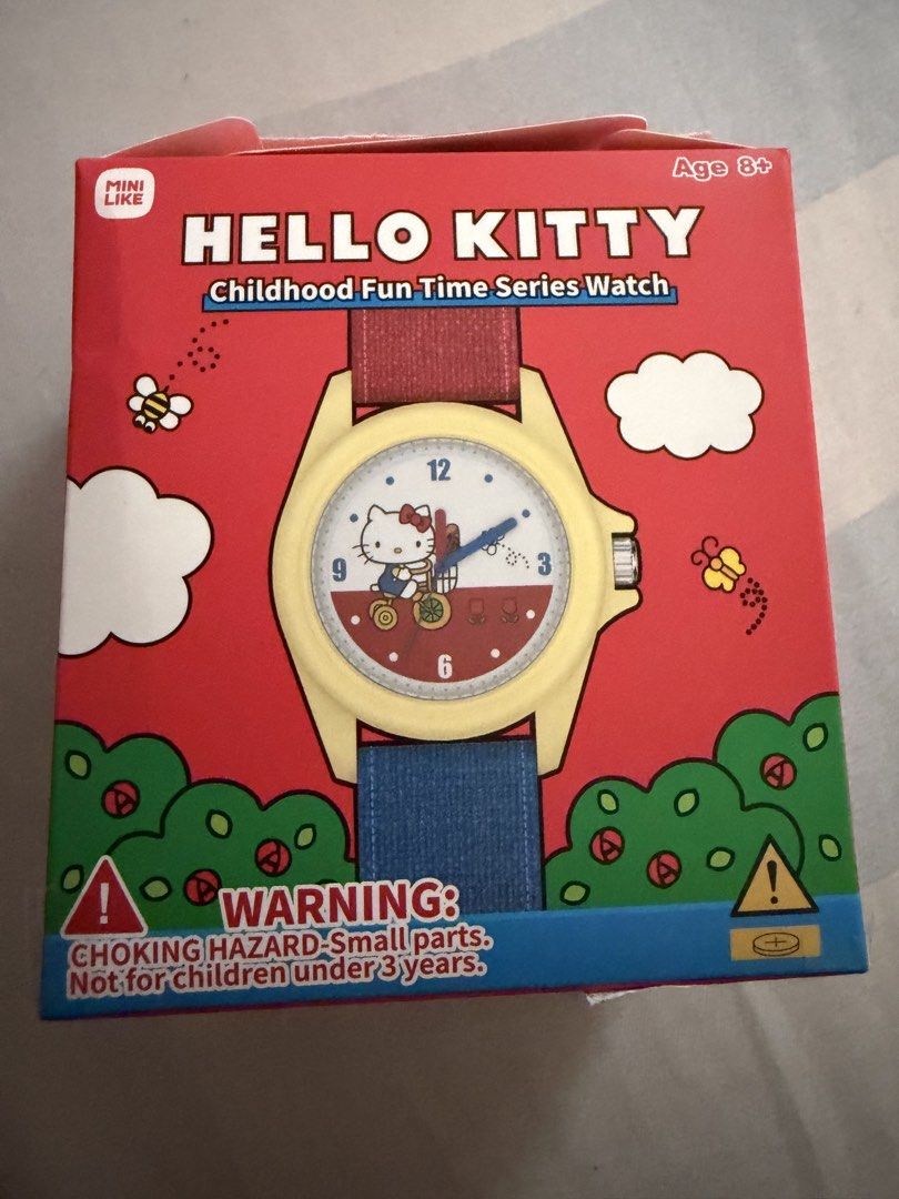 Hello Kitty Childhood Fun Time Series Watch (Category: Women's Watches) located in Cainta. Submitted by itsbambam (Listing ID 1434862697, Image 3). Description: NEW Hello Kitty Childhood Fun Time Series Watch - Features a pink watch face with Kitty reading - Part of the 1/12 Sweetheart Reading series - Suitable for ages 8+ - Battery model: LR626 - Comes with box .