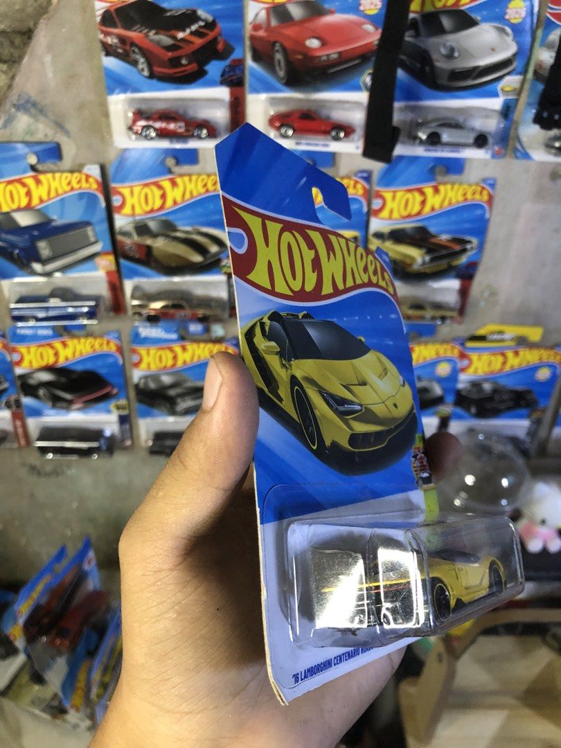 Hot Wheels '16 Lamborghini Centenario Roadster (Category: Vehicle & Diecast Models) located in Manila. Submitted by mariellathrift (Listing ID 1434833491, Image 3). Description: - Hot Wheels '16 Lamborghini Centenario Roadster - Exotics series - Color: Yellow with black accents - 1/10 in the series - Number 2/250 - Suitable for ages 3+.