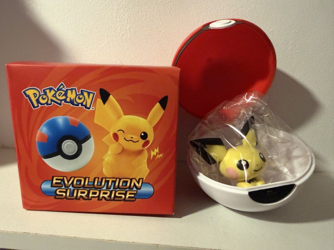 Jollibee Pokemon Evolution Surprise Figure - Pichu (Category: Designer & Blind Box Toys) located in Manila. Submitted by chombyyy (Listing ID 1434886951, Image 1). Description: Jollibee Pokemon Evolution Surprise Figure - Pichu. Includes box, red Pokeball, and Pichu figure. Collectible item..