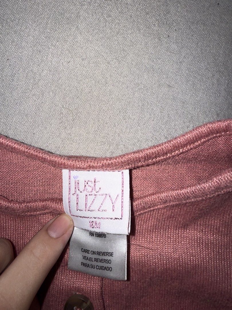 Just Lizzy Baby Top 18M (Category: Babies & Kids Fashion) located in Cavite. Submitted by Mj_BABY_CLOTHES (Listing ID 1434881801, Image 2). Description: - Brand: Just Lizzy - Size: 18 months - Color: Dusty Rose - Features: Round neckline, two buttons, long sleeves, ruffle detail.