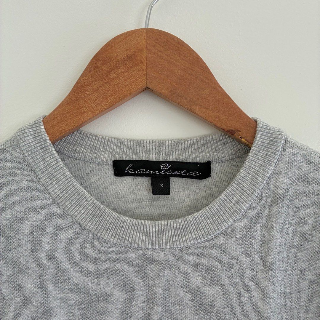 Kamiseta Crewneck Top in Grey (Category: Shirts) located in Manila. Submitted by sellingmystufffff (Listing ID 1434811534, Image 3). Description: Used once Small on tag Actual photos posted.