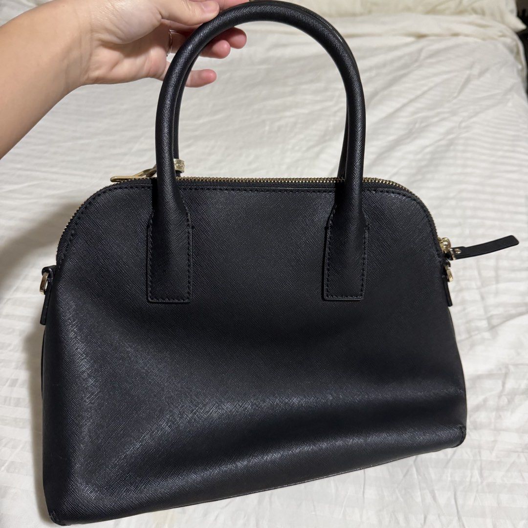 Kate Spade Bag & Wallet Bundle (Category: Luxury Bags & Wallets) located in Makati City. Submitted by yourtreasureparadise (Listing ID 1434964709, Image 3). Description: Bag has no call out, no issue. Does not come with sling strap. Wallet in great condition too, just coin residue on coin slot. Available until May 2 only.