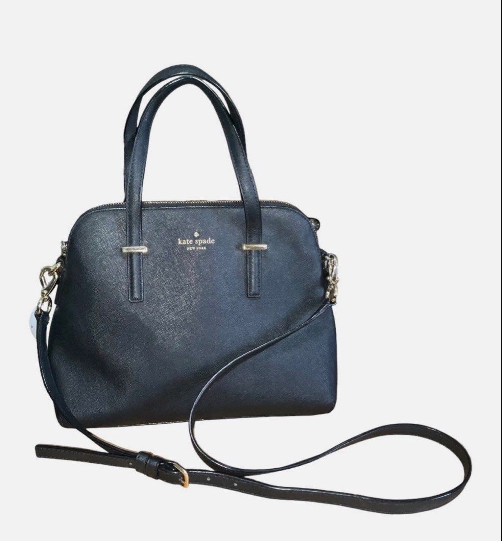 Kate Spade Black Satchel Bag (Category: Luxury Bags & Wallets) located in Manila. Submitted by happyeight (Listing ID 1434921873, Image 1). Description: Kate Spade satchel bag - Black leather - Top handle and detachable shoulder strap - Gold-toned hardware - Interior patterned lining - Features Kate Spade New York logo.