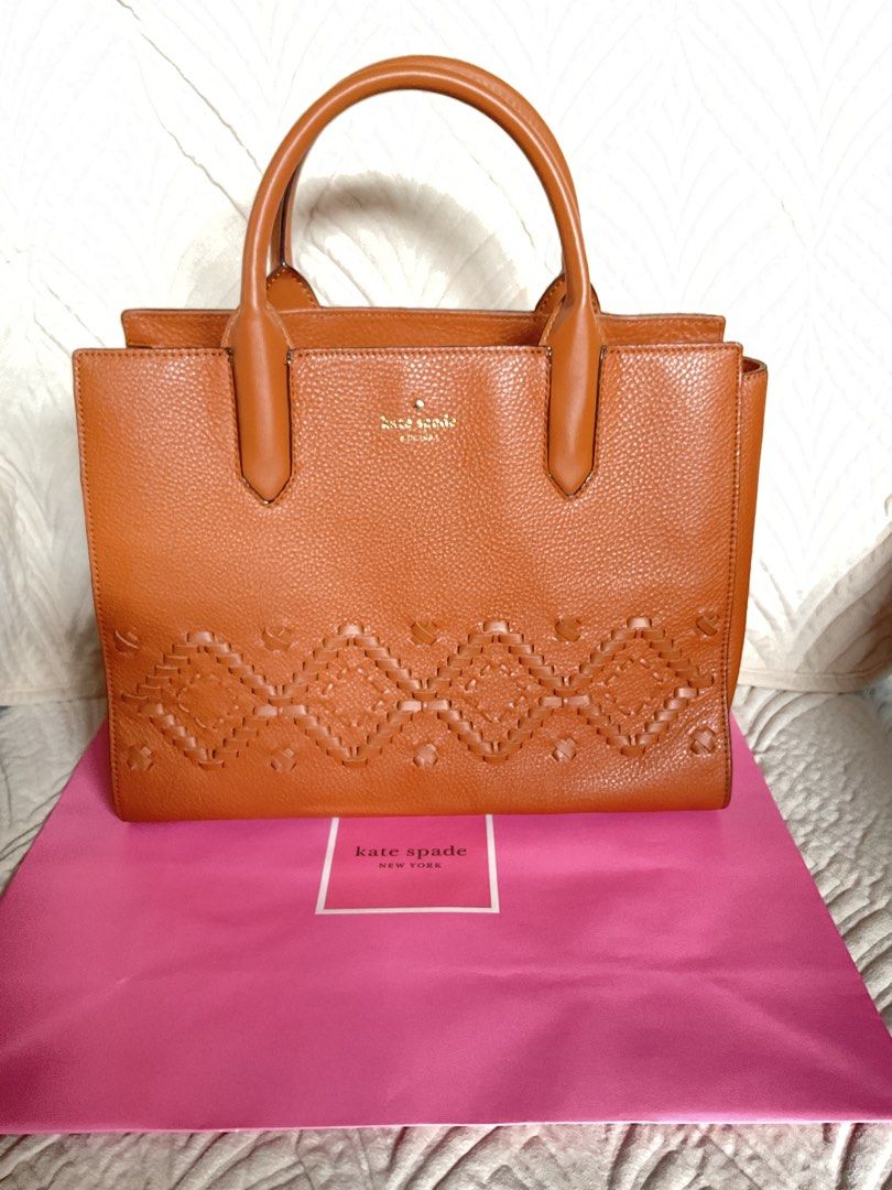 Kate Spade Leather Handbag (Category: Luxury Bags & Wallets) located in Quezon City. Submitted by u.s_cleancloset (Listing ID 1434848105, Image 1). Description: - Authentic Kate Spade handbag - Almost New conditon - Brown leather exterior with woven design - Two top handles - Spacious interior - pink Kate Spade shopping bag -limited edition.