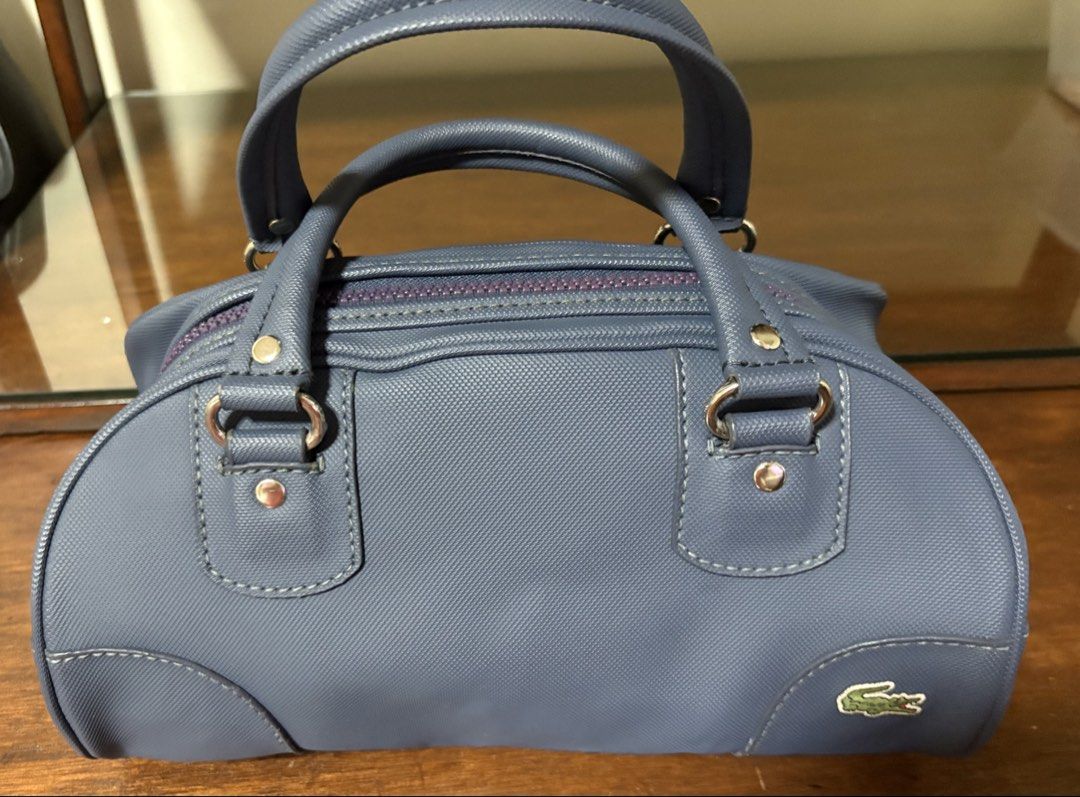 Lacoste Bag (Category: Luxury Bags & Wallets) located in Marikina City. Submitted by curated2020 (Listing ID 1434940636, Image 1). Description: Vintage Lacoste Bag Payment -Gcash or Paymaya only Courier fee - I will arrange thru grab or lalamove then add the amount..