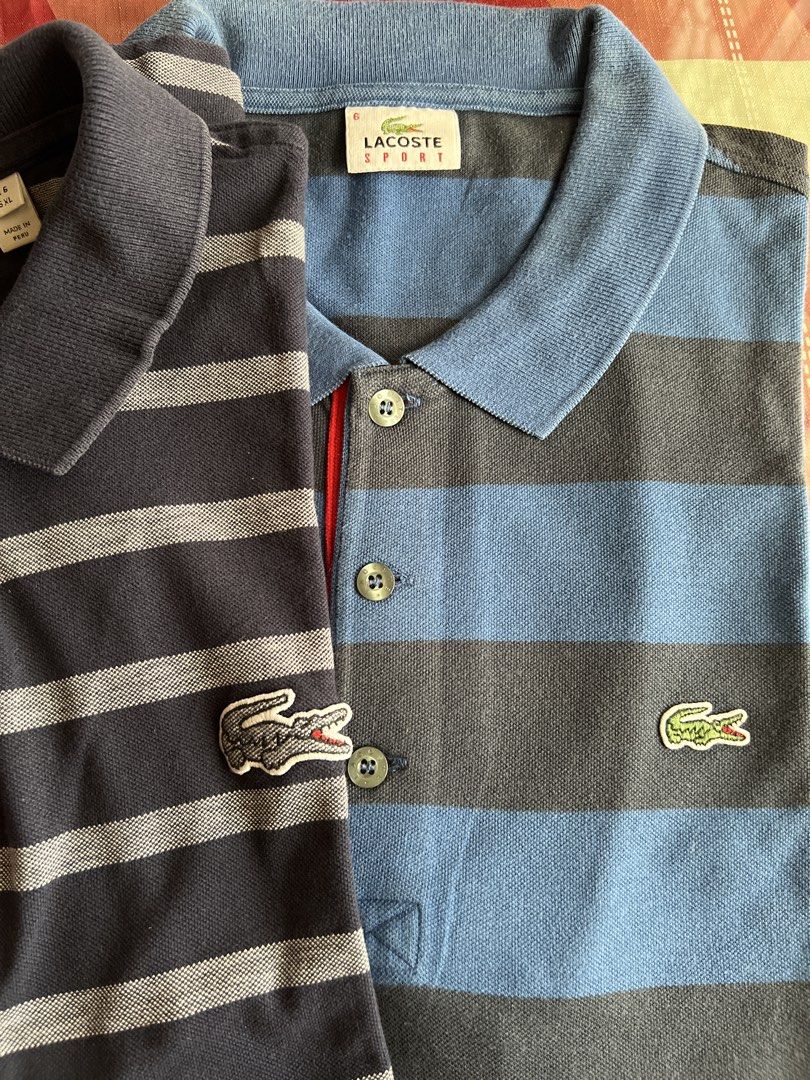 Lacoste Striped Polo Shirts (Category: Tshirts & Polo Shirts ) located in Quezon City. Submitted by stashandstuff (Listing ID 1434899551, Image 3). Description: -Preloved; 100% original - Shirt 1: Blue and grey, "SPORT" label. - Shirt 2: Navy and grey, "REGULAR FIT" label. - Take 2 for only 2800 .