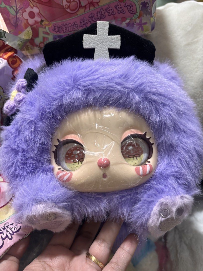 Liila's Marshmallow Bunny Bag (Category: Luxury Bags & Wallets) located in Manila. Submitted by kathylandia (Listing ID 1434994316, Image 2). Description: - Lila's Marshmallow Bunny Bag - Adorable fluffy purple bunny design - Features a cute bunny face and nurse hat - Includes matching strap and box - Brand new, still in original packaging.