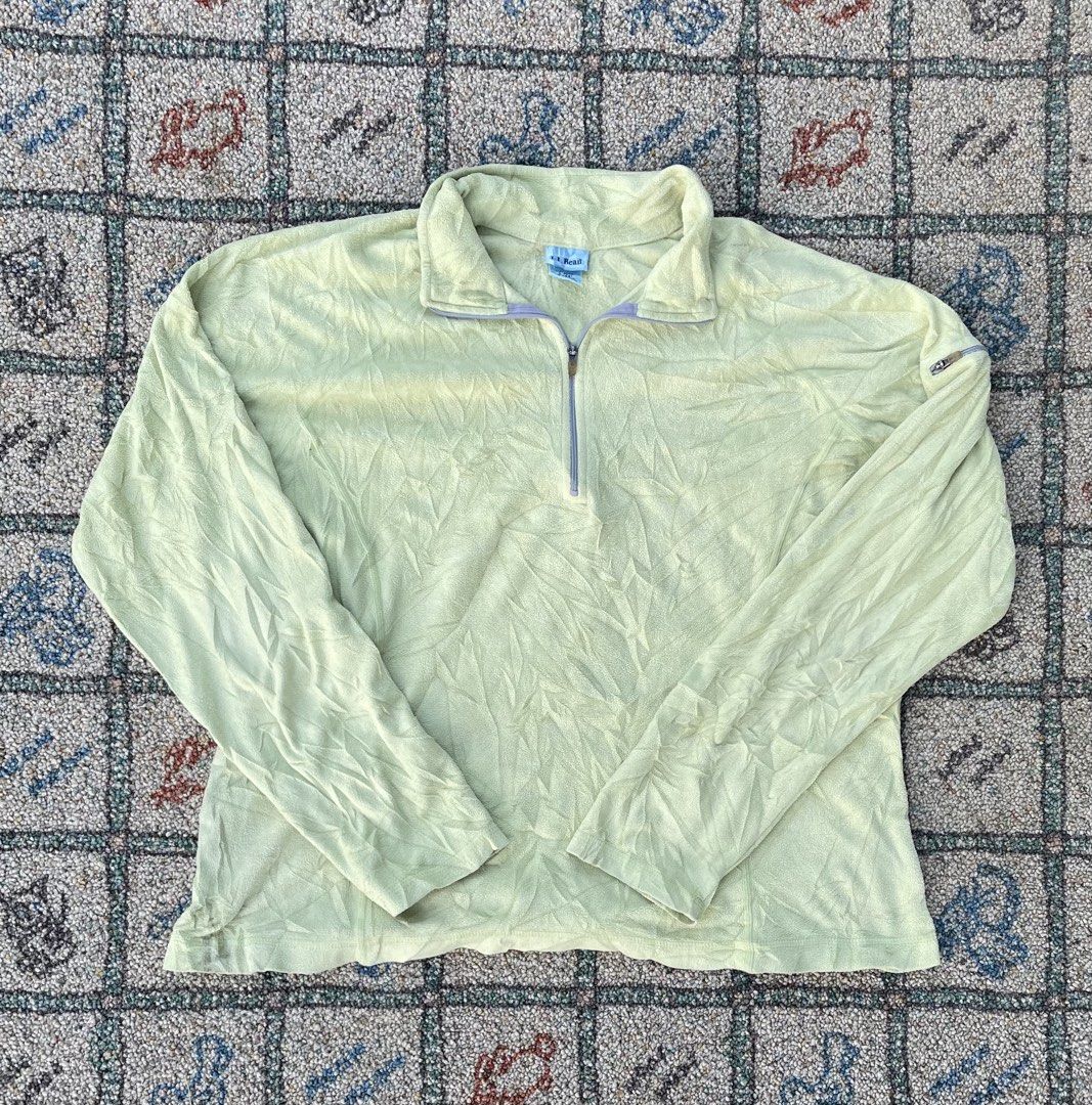L.L. Bean Quarter-Zip Fleece Sweater (Category: Coats, Jackets and Outerwear) located in Manila. Submitted by stepsole (Listing ID 1434995708, Image 1). Description: - L.L. Bean fleece sweater - Quarter-zip closure - Stand-up collar - Long sleeves - Light green color - Soft, textured material - Small logo detail - Versatile for layering.