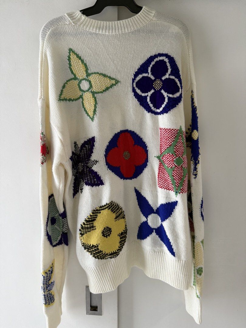 Louis Vuitton Flower Monogram Sweater (Category: Luxury Apparel) located in Quezon City. Submitted by closetreset.qc (Listing ID 1434849163, Image 2). Description: - Length: 28” Width 21” - Cream-colored sweater - Medium on tag - Floral pattern - Crew neck - Long sleeves - Ribbed hem and cuffs - Relaxed fit - Louis Vuitton label.