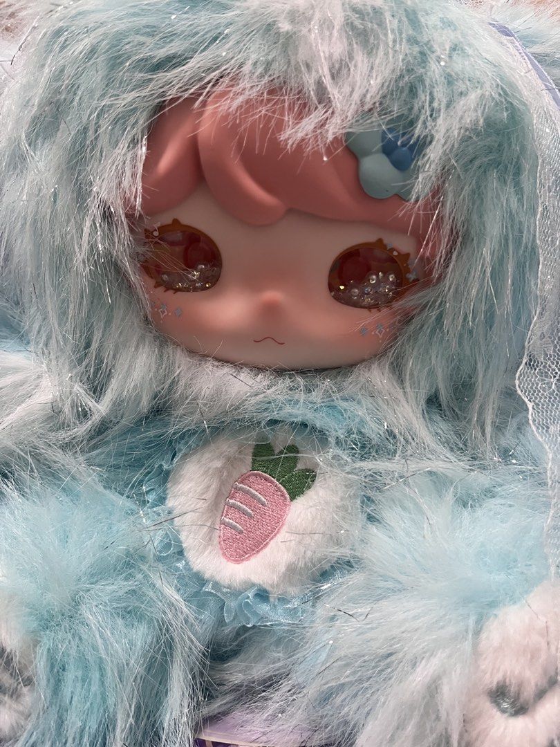 Luxi 400 % Cheer Bunny Blind Box Figure (Category: Designer & Blind Box Toys) located in Calamba. Submitted by thepinkpicksee (Listing ID 1434978764, Image 2). Description: - Adorable Cheer Bunny figure - Blue bunny costume - Pink hair and sparkling eyes - Fluffy costume with long ears - Original packaging with Cheer Bunny illustrations - Cute embroidered paw details.