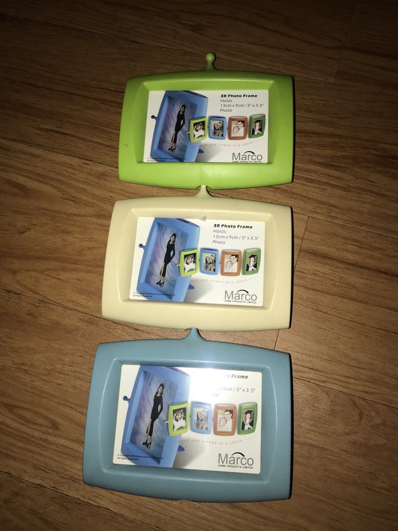 Marco 3R/5R Photo Frames (Category: Frames & Pictures) located in Pasig City. Submitted by papotzy (Listing ID 1434876651, Image 1). Description: - Set of 3 Marco photo frames - Colors: Green, White, and Blue - Holds 3R or 5R photos - Unique TV-like shape - Features a small stand - Removable back for easy photo insertion Take all fir 100.