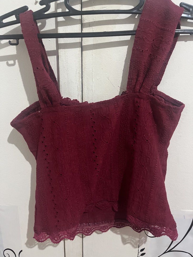 Maroon Lace Top with Bows Red Sleeveless (Category: Sleeveless) located in Manila. Submitted by thelineshopp (Listing ID 1434959955, Image 2). Description: - Maroon lace top - Wide straps with bow accents - Scalloped lace trim (neckline & hem) - Cropped style - Ideal for high-waisted bottoms.