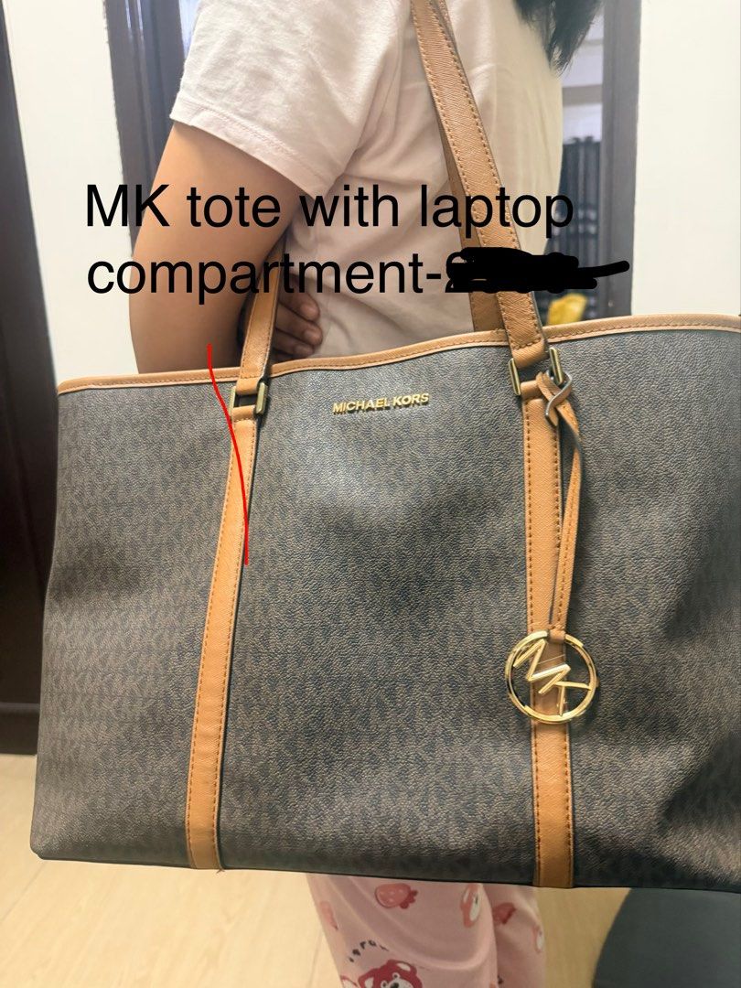 Michael Kors Tote Bag with Laptop Compartment (Category: Tote Bags) located in Quezon. Submitted by checaslang (Listing ID 1430337778, Image 1). Description: decluttering..super sale na super nice and very nice pa.