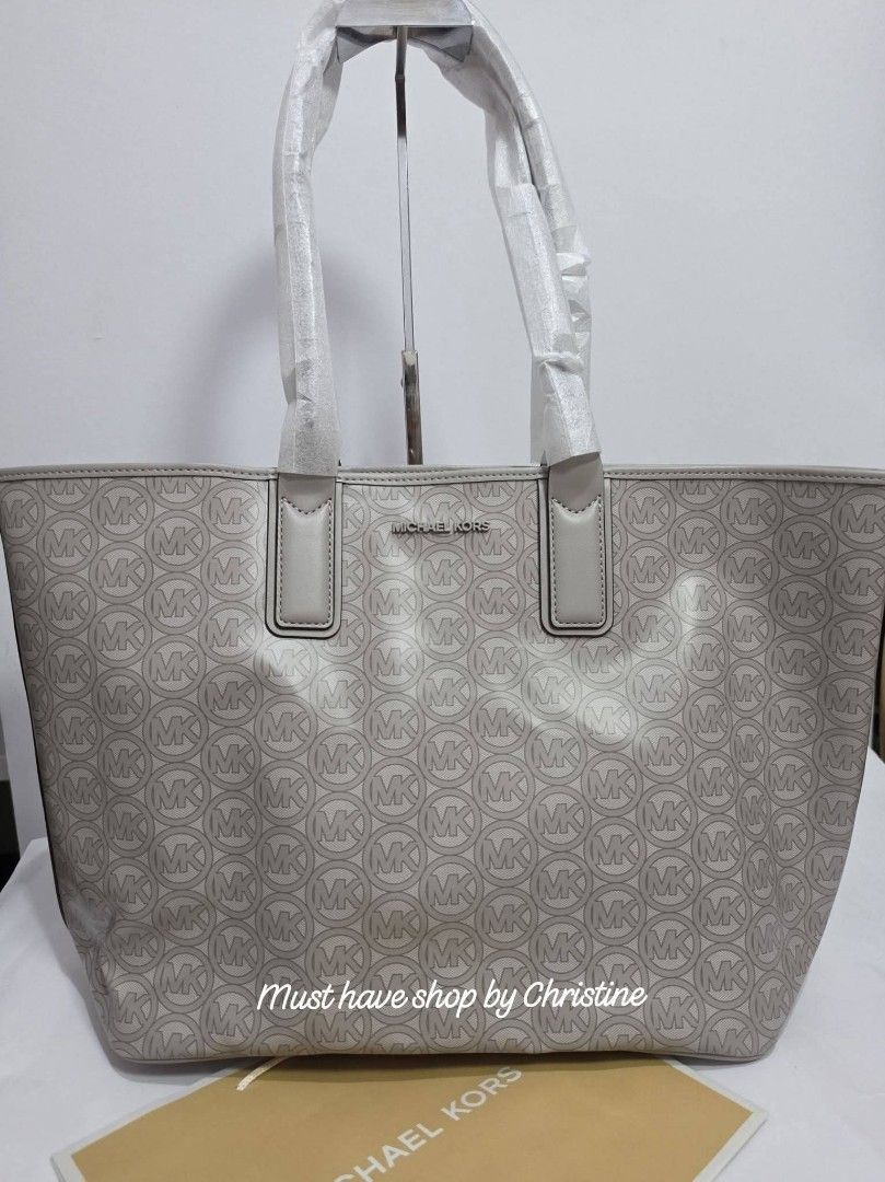 MK jodie large in pearl gray (Category: Luxury Bags & Wallets) located in Bauang. Submitted by chictine (Listing ID 1382468510, Image 2). Description: Brandnew With tag and carecard Source from US 💯% original or moneyback ✅ cod/cop accepted ✅ open for layaway 📍Bauang, La Union For more bags and proof of transactions, please visit my Fb page: Must have shop by Christine.