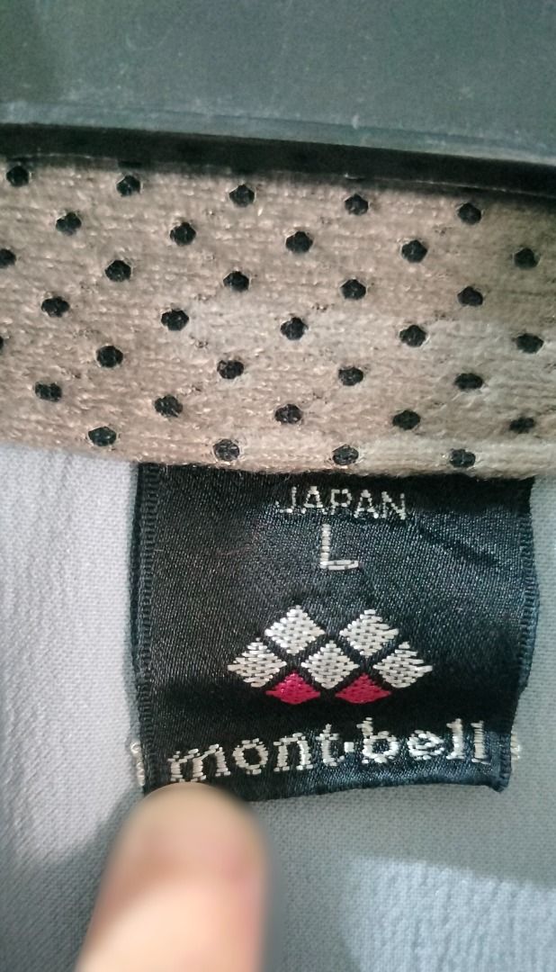Montbell Lightweight Jacket Japan (Category: Coats, Jackets and Outerwear) located in Manila. Submitted by rinroo (Listing ID 1434889644, Image 3). Description: - Light grey Montbell jacket - Full zip closure - High collar - Two zippered pockets - Darker grey sleeves - Montbell logo on chest - size: Large.