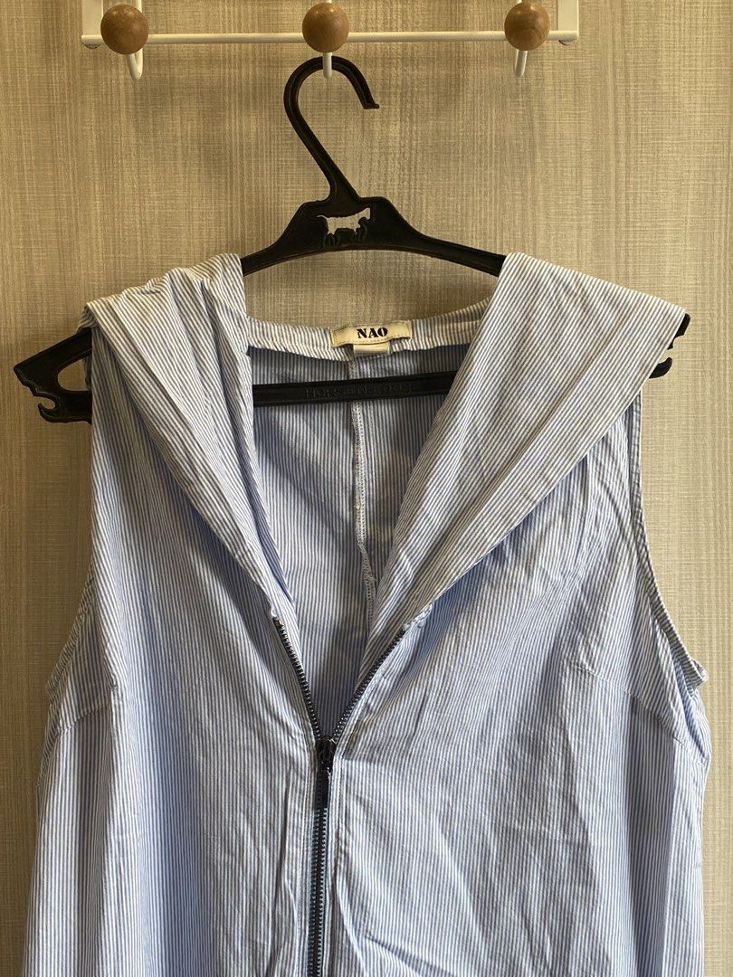 NAO Sleeveless Striped Jumpsuit (Category: Jumpsuits) located in Manila. Submitted by juneqbl (Listing ID 1434862461, Image 3). Description: Sleeveless jumpsuit with zipper. Features a blue and white striped pattern. The brand tag is visible. It has a relaxed fit and a straight leg..