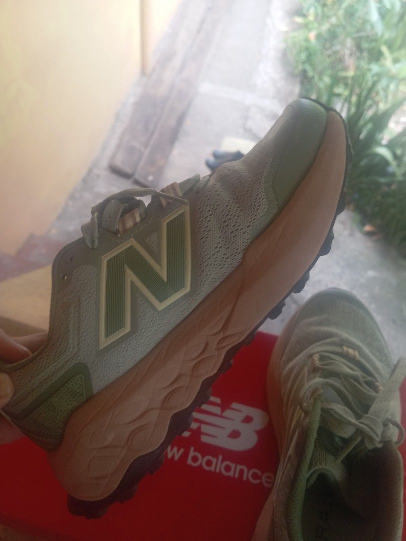 New Balance Trail Running Shoes (Category: Sneakers) located in Pagbilao. Submitted by prelovedktrn (Listing ID 1434873236, Image 2). Description: - New Balance trail running shoes - Women's size: 6.5 US / 4.5 UK / 37 EUR - Color: Green and brown - Model: WTGAROP2 - Features Hydrohesion sole technology - Condition: Good.
