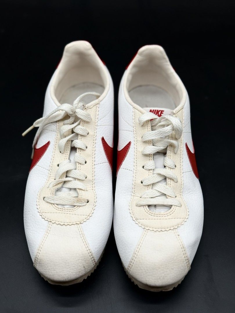 Nike Cortez White Red Blue Sneakers (Category: Sneakers) located in Quezon City. Submitted by opulist (Listing ID 1434965873, Image 3). Description: - 100% AUTHENTIC Nike Cortez sneakers - White with red swooshes and accents - Blue stripe on midsole - Nike logo on heel tab - White laces - minimal wear on soles.