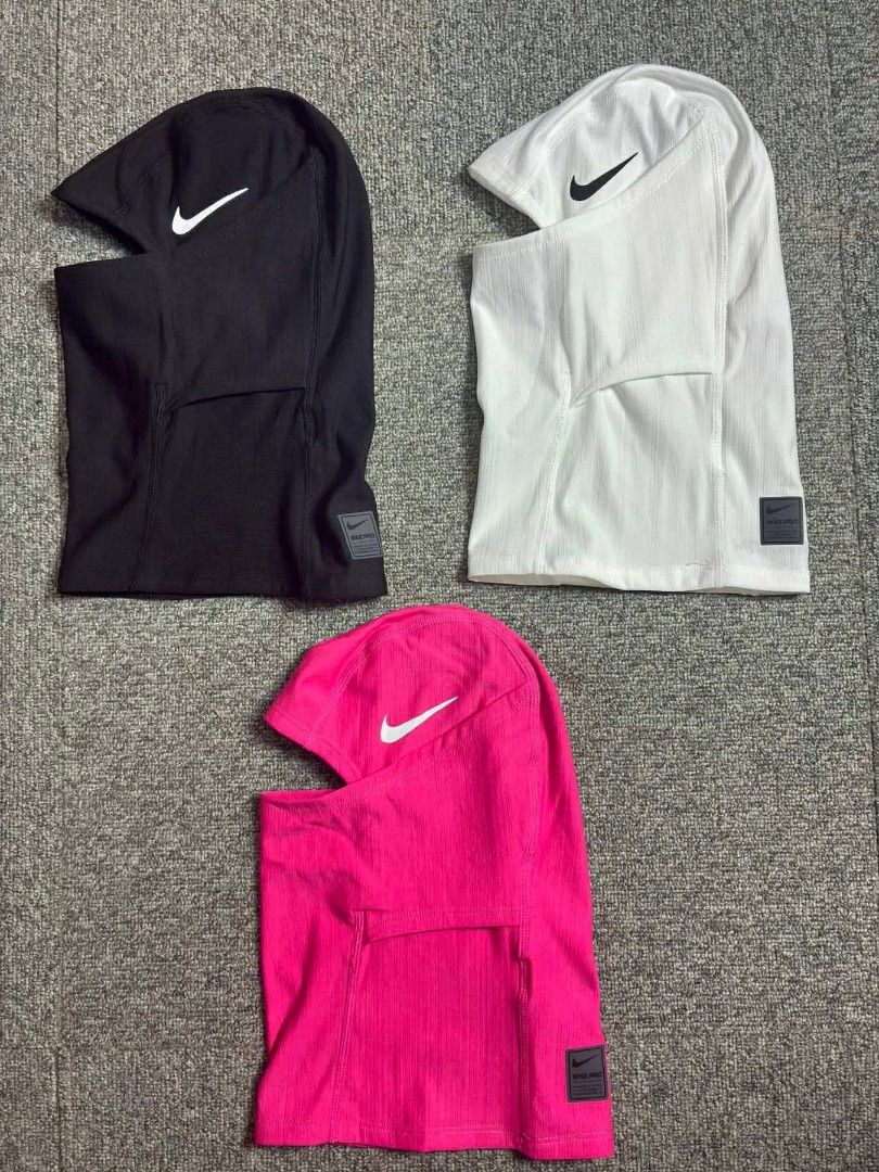 Nike Pro Therma-FIT Hood (Category: Activewear) located in Manila. Submitted by tipaklongthrift (Listing ID 1434840716, Image 2). Description: - Nike Pro Therma-FIT Hood - Available Colors: Black, White, Pink, Camouflage, Camo-like pattern - Features Nike logo - Provides warmth and coverage - Comes with original packaging.