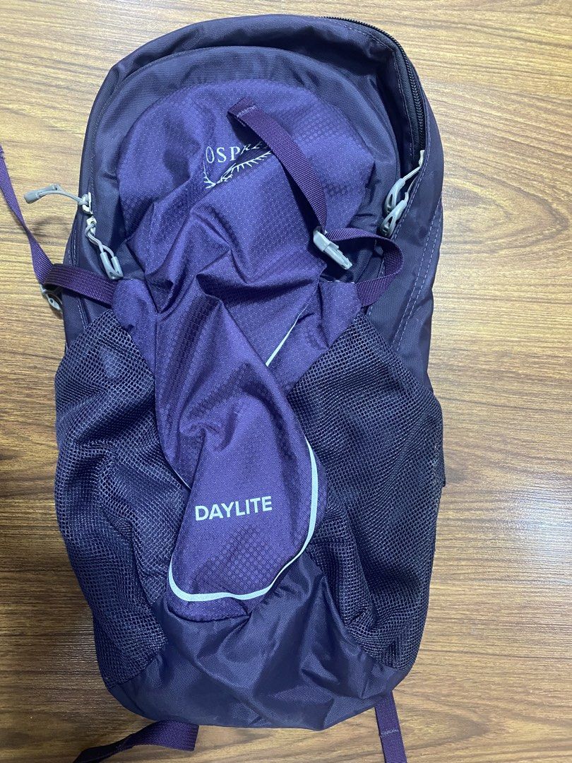 Osprey Daylite Backpack 13L (Category: Backpacks) located in Makati City. Submitted by ann.declutter (Listing ID 1434879772, Image 1). Description: - Osprey Daylite backpack - Deep purple color - Ideal for day trips - Main compartment for storage - Side mesh pockets for water bottles - Adjustable straps for a comfortable fit - Padded shoulder straps - Breathable back panel.